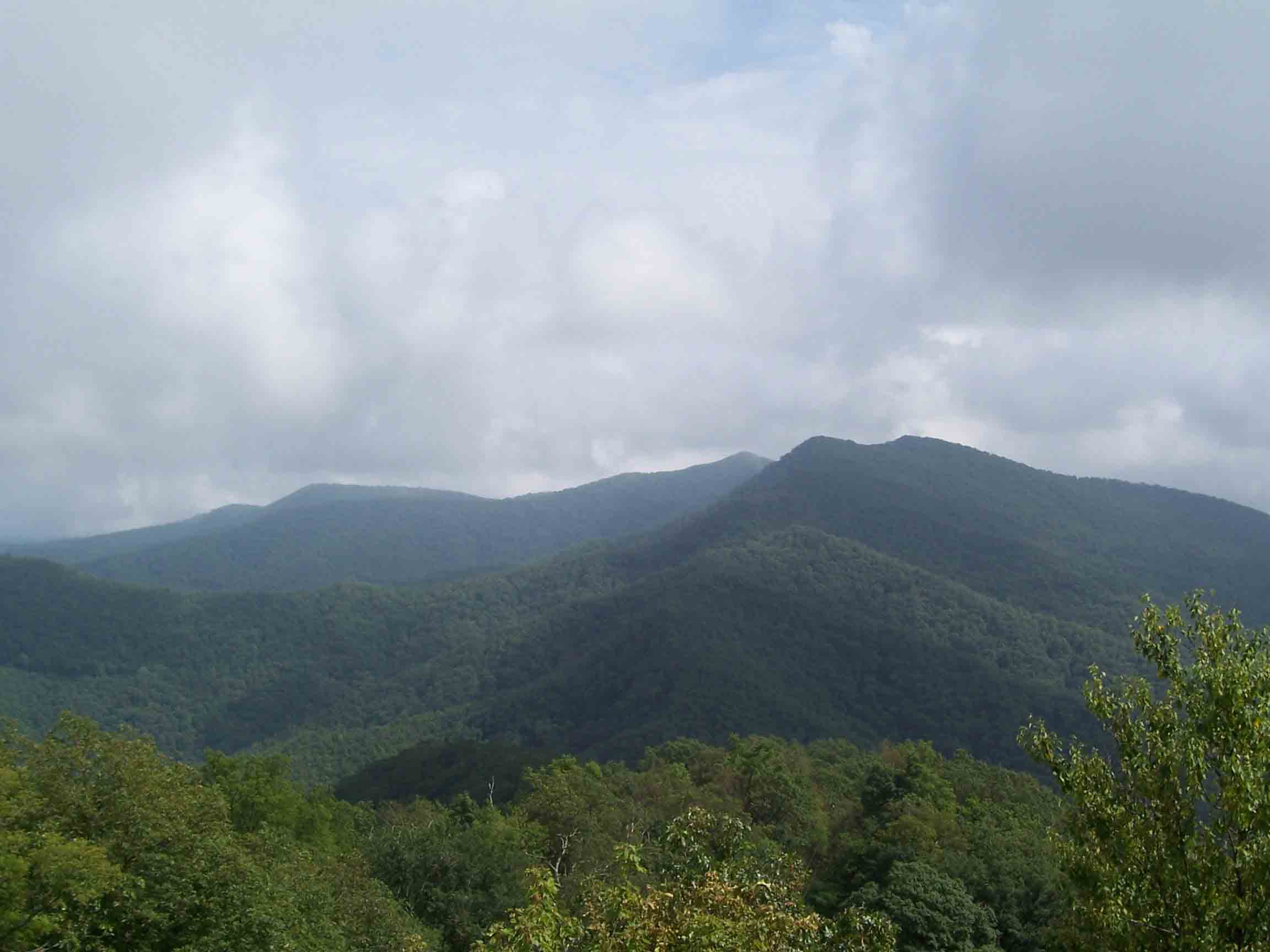 mm 6.5 - Taken from Wesser Bald, this pic shows Rocky Bald ascending out of Tellico Gap, Black Bald, Copper Ridge Bald with Wayah Bald in the Left background. Courtesy willey54@yahoo.com